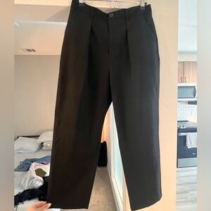 High-waisted pleated trousers